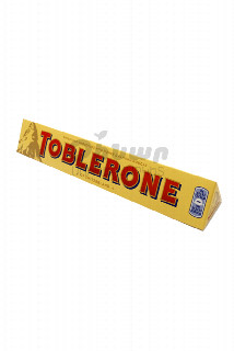 00-00029841 Շոկոլադե սալիկ «Toblerone» Կաթնային 100գ 1080   Շվեցարիա  Կաթնային շոկոլադ` մեղրով և նուշի նուգայով;.jpg