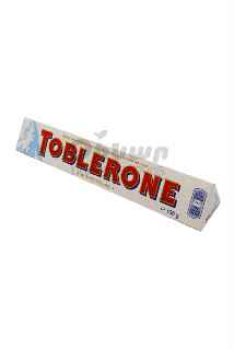 00-00052885 Շոկոլադե սալիկ «Toblerone» սպիտակ 100գ  1080 Շվեցարիա Շվեյցարական սպիտակ շոկոլադ՝ մեղրով և նուշով պատրաստված նուգայով։.jpg